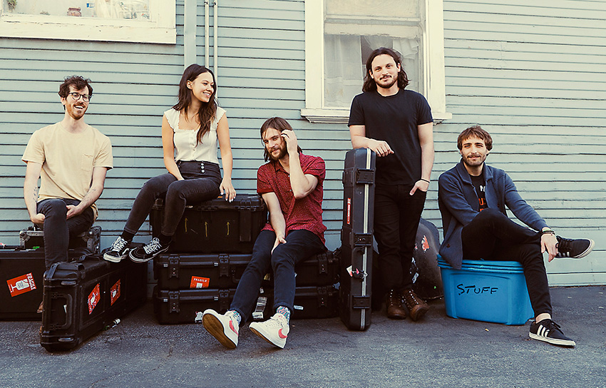 Mt. Joy bandmates posing outside