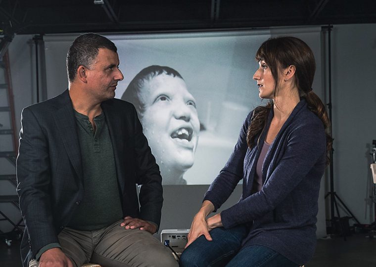 Ian Brown sitting down with interviewer