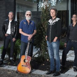 Blue Rodeo bandmates posing