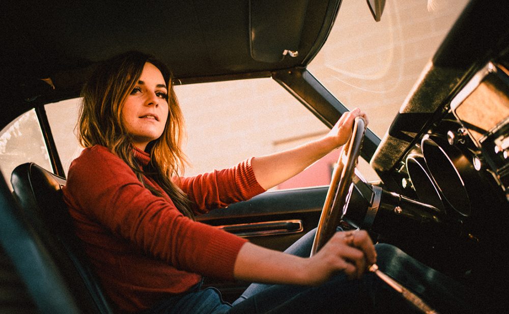 Mariya Stokes driving a car