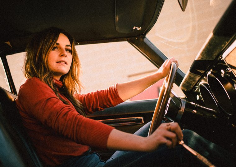 Mariya Stokes driving a car