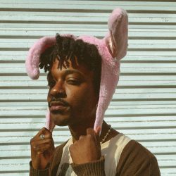 SEB wearing a pink bunny hat