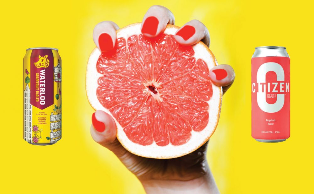 Person squeezing a grapefruit