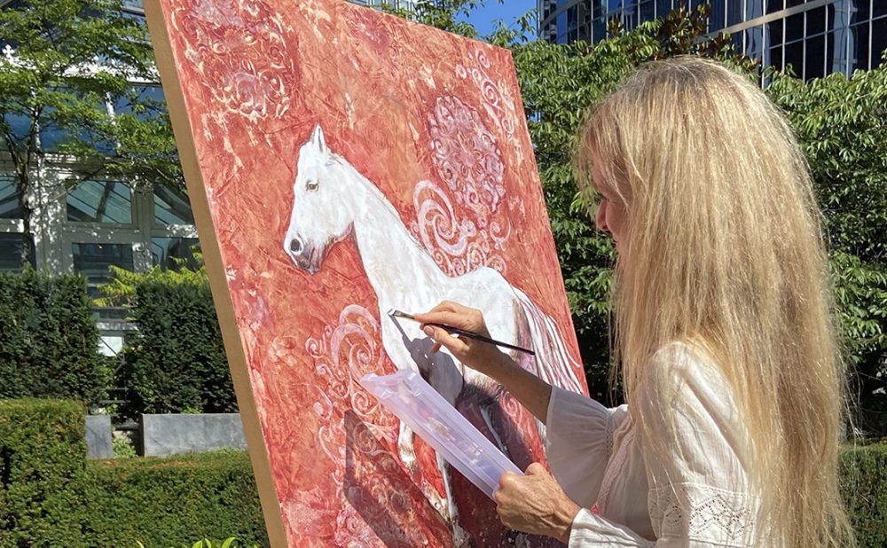 Person making art in the park