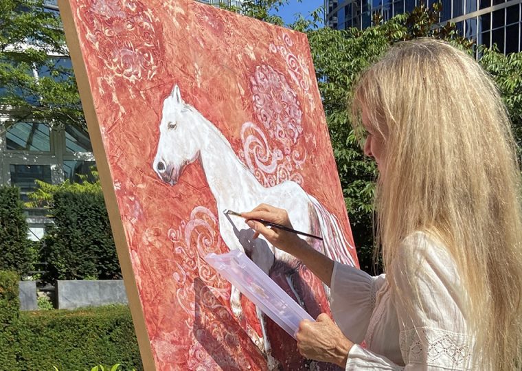 Person making art in the park