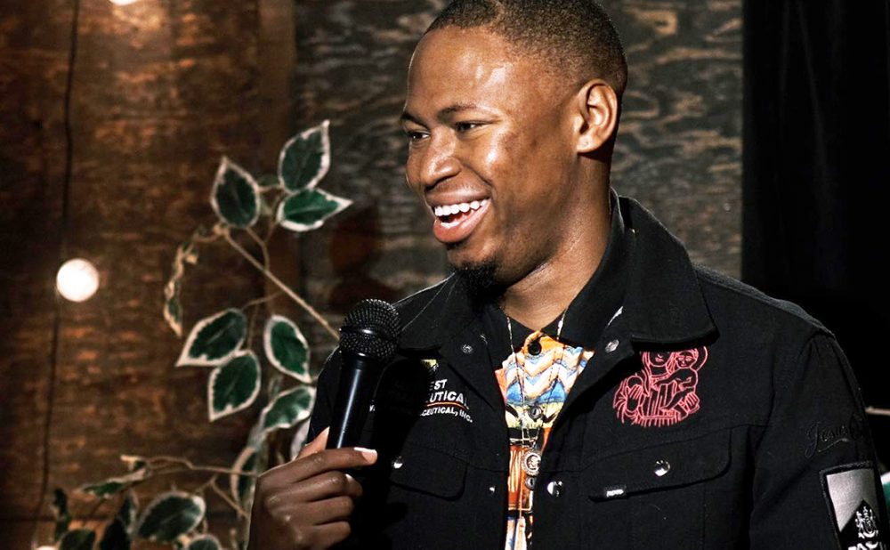 Comedian on stage at Jokes Please!