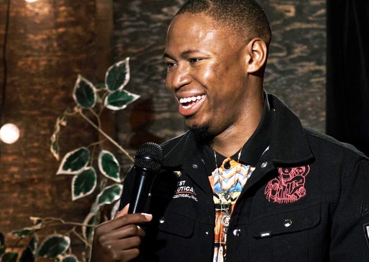 Comedian on stage at Jokes Please!