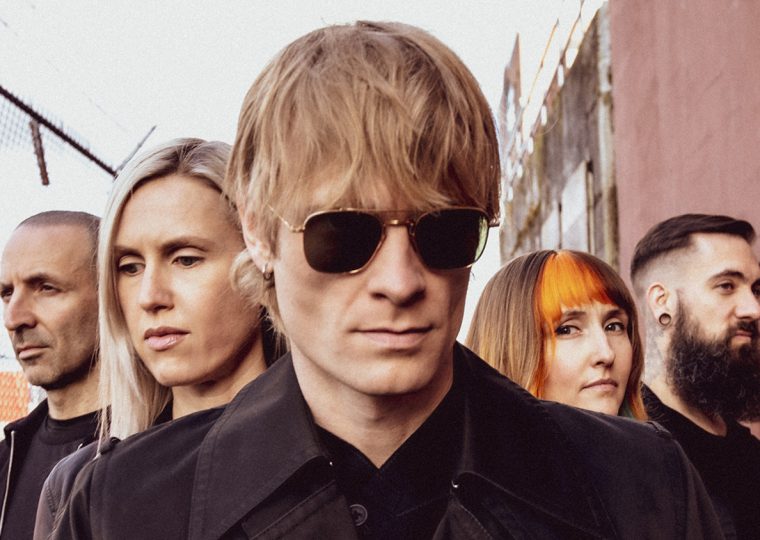 Mother Mother bandmates posing outside