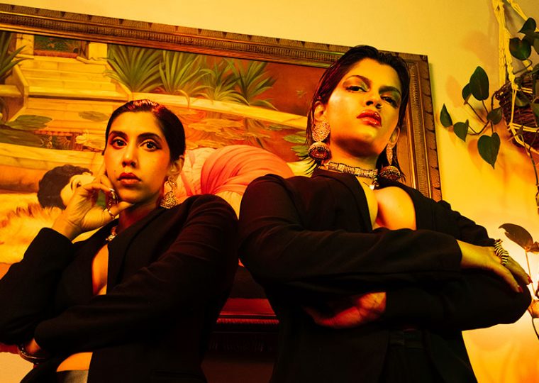 Cartel Madras posing with the camera angled up