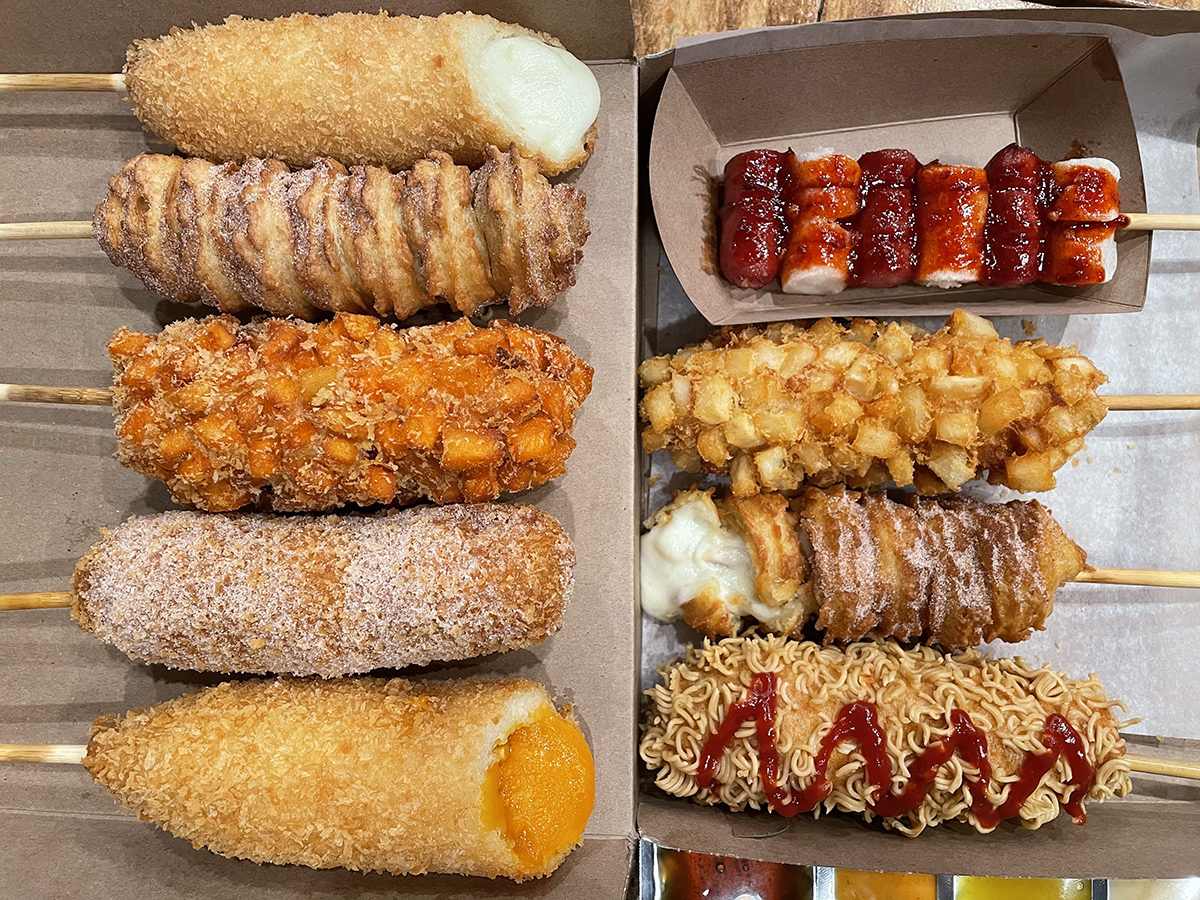 An assortment of tokkebi (Korean corn dogs) from Toronto's K Seoul Hot Dog.