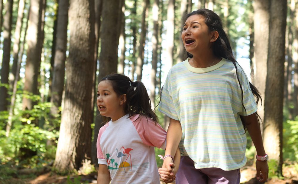 Kiawentiio and Violah Beauvais in a scene from the film Beans.