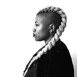 Profile shot of Sate in black and white.