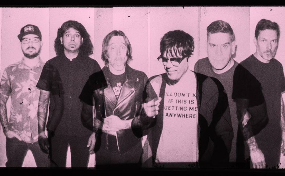Billy Talent and Rivers Cuomo from Weezer posing side by side.