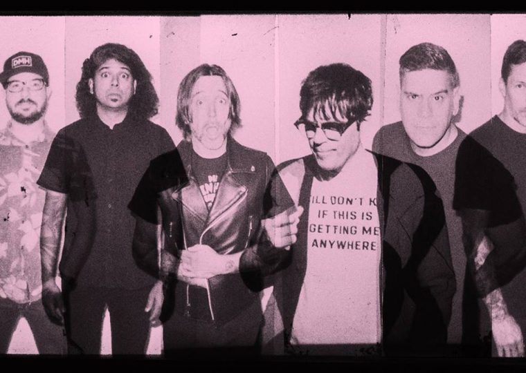 Billy Talent and Rivers Cuomo from Weezer posing side by side.