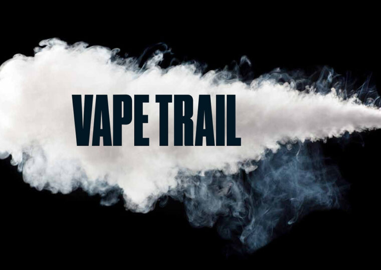A cloud of smoke against a black background with the word VAPE TRAIL placed over the smoke