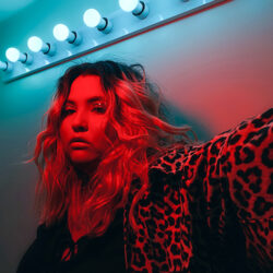 Stylized photo of Nimkish with red and blue lighting