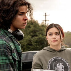 Scene from Reservation Dogs of a girl looking at a boy who's not facing her