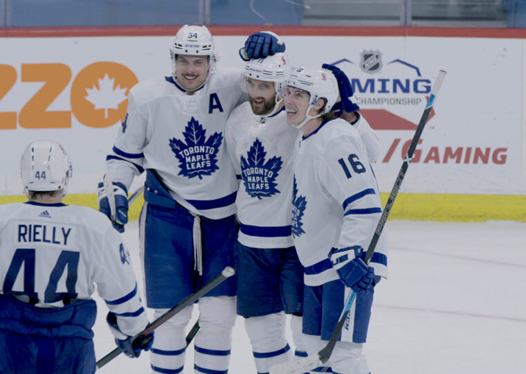Photo of four Toronto Maple Leafs' hockey players