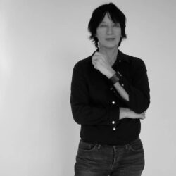 Black and white photo of Carole Pope.