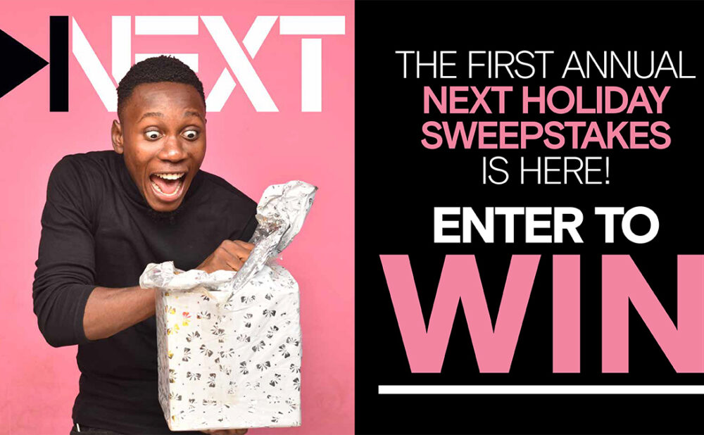 A man opening a gift wrapped box with excitement and the words 