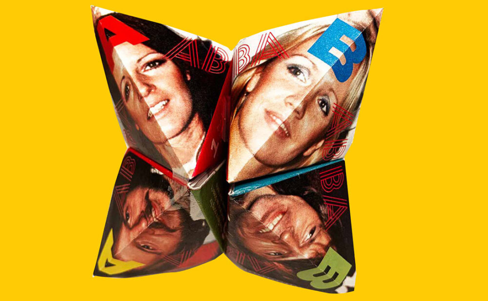 A cootie catcher made up of the faces of ABBA.