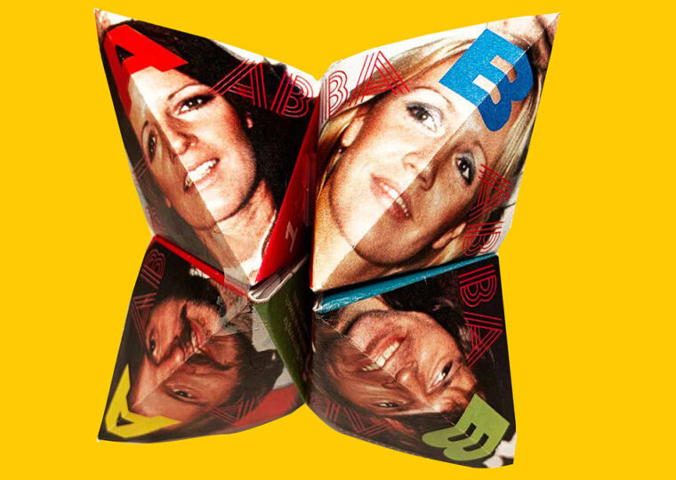 A cootie catcher made up of the faces of ABBA.