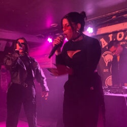 Cartel Madras performing on stage at steak house